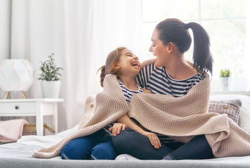 Woman and child on couch