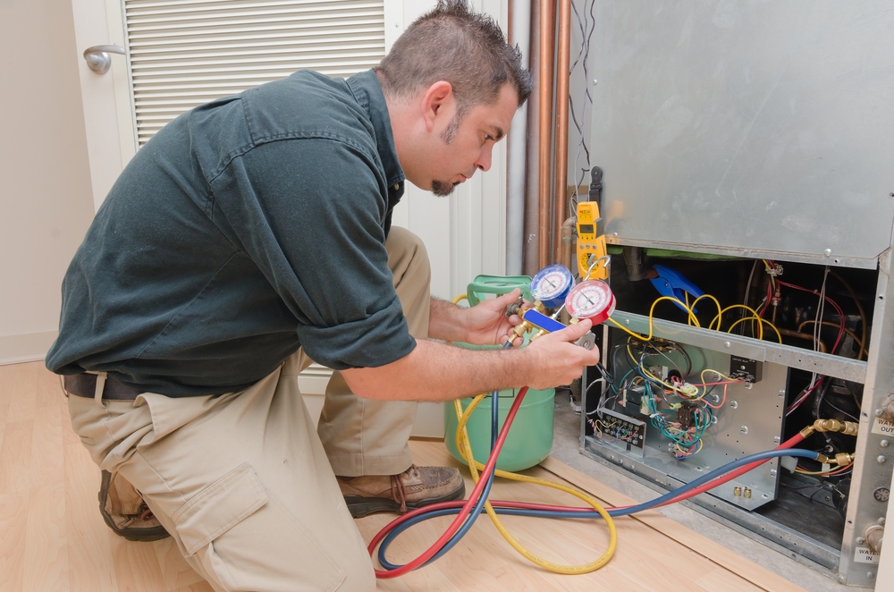 Person doing a HVAC residential maintenance