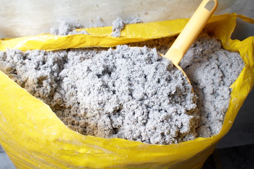 Bag of Cellulose Insulation With Plastic Scoop