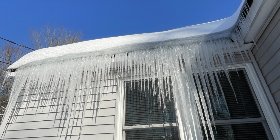 Ice Dam Side of House Over Window
