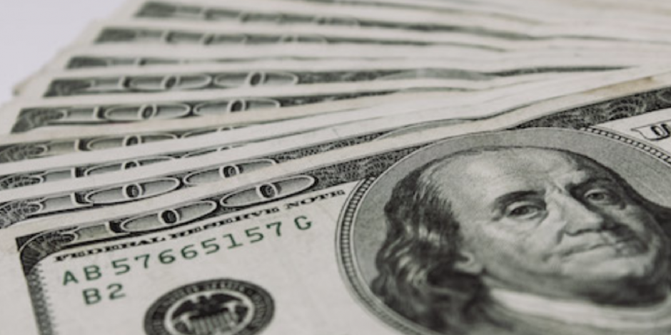 100 dollar bills used as background for Insulation Tax Credit Campaign
