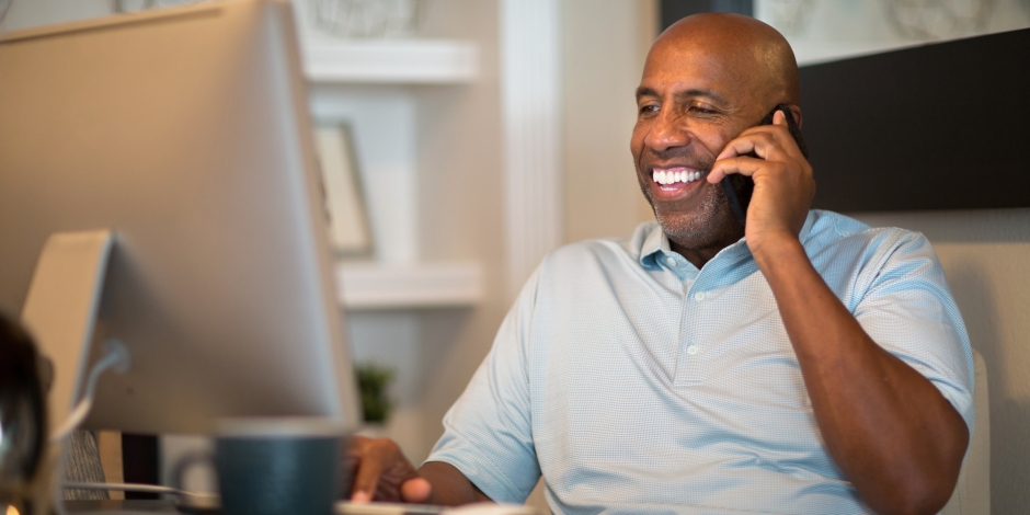 Smiling man on phone