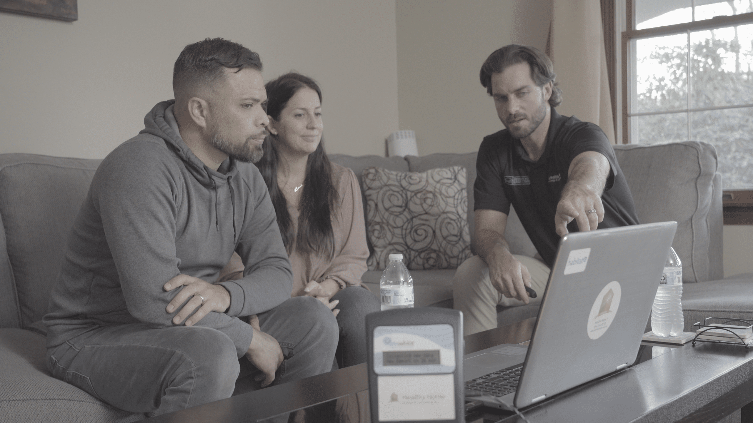 Healthy Home Energy & Consulting Discussing Home Health With Couple